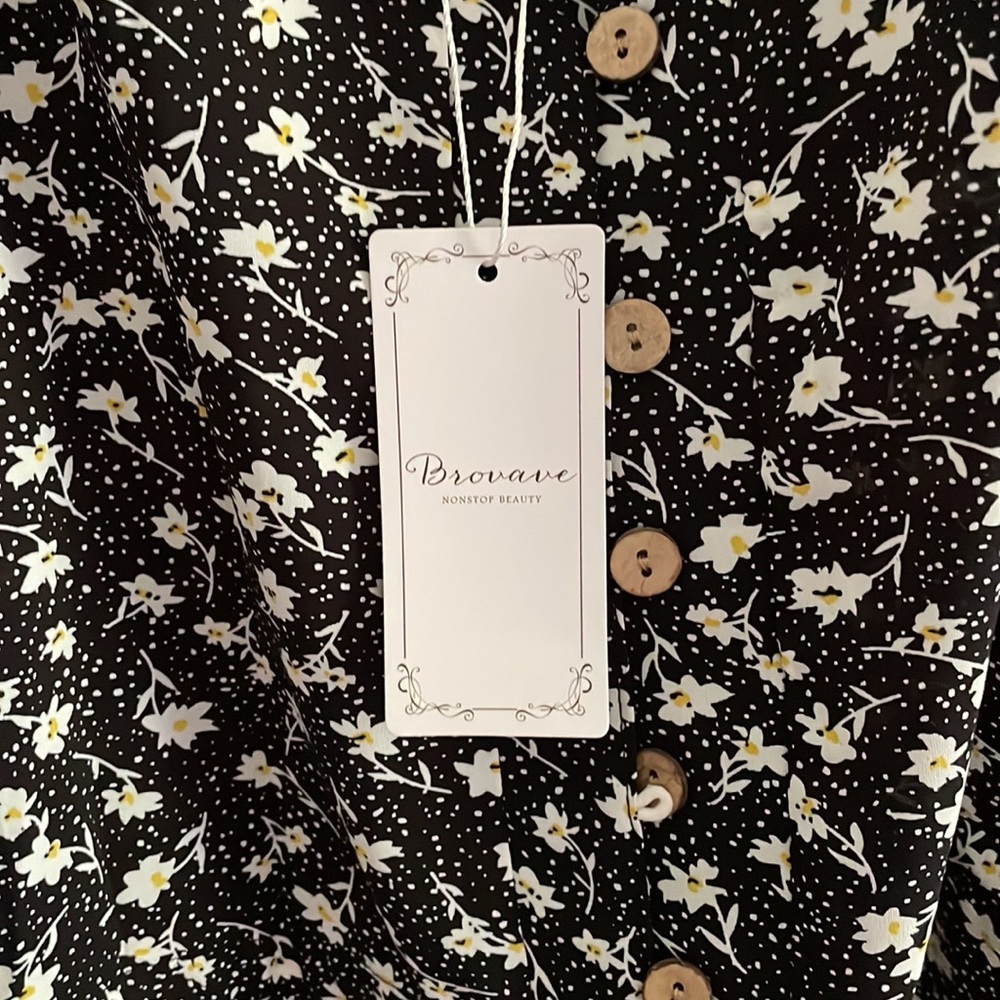 Black sun dress w/white flowers and buttons down the front. Tie waist. - Picture 7 of 7